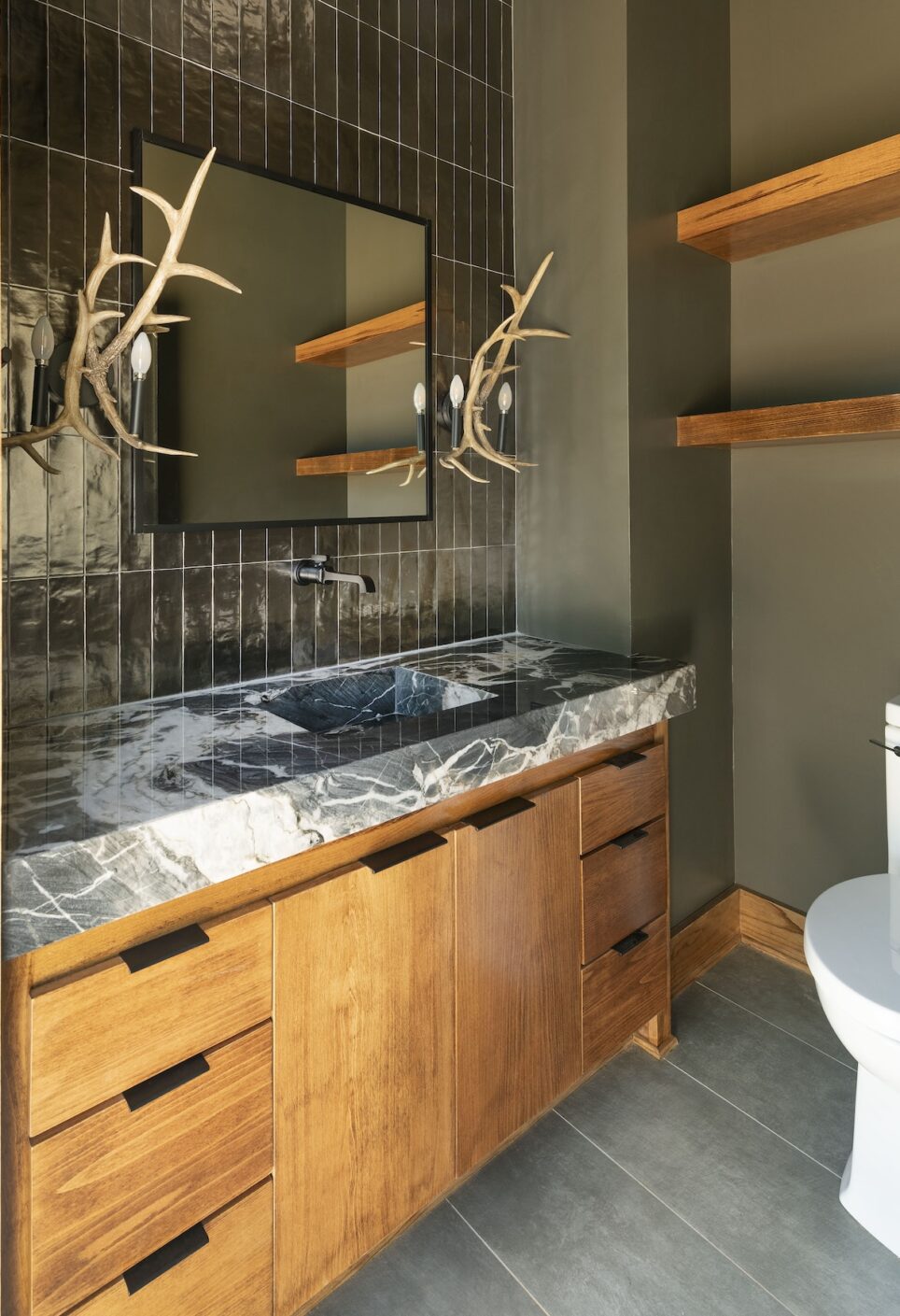 Bathroom With Antler Lighting Sconces