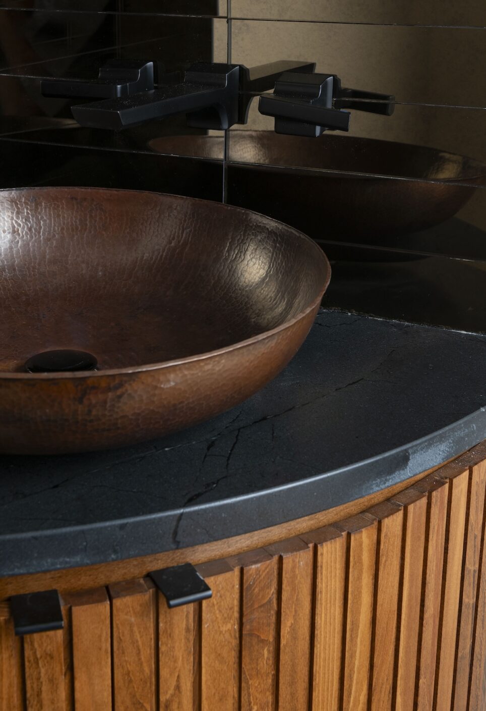 Copper Sink Detail Black Countertop